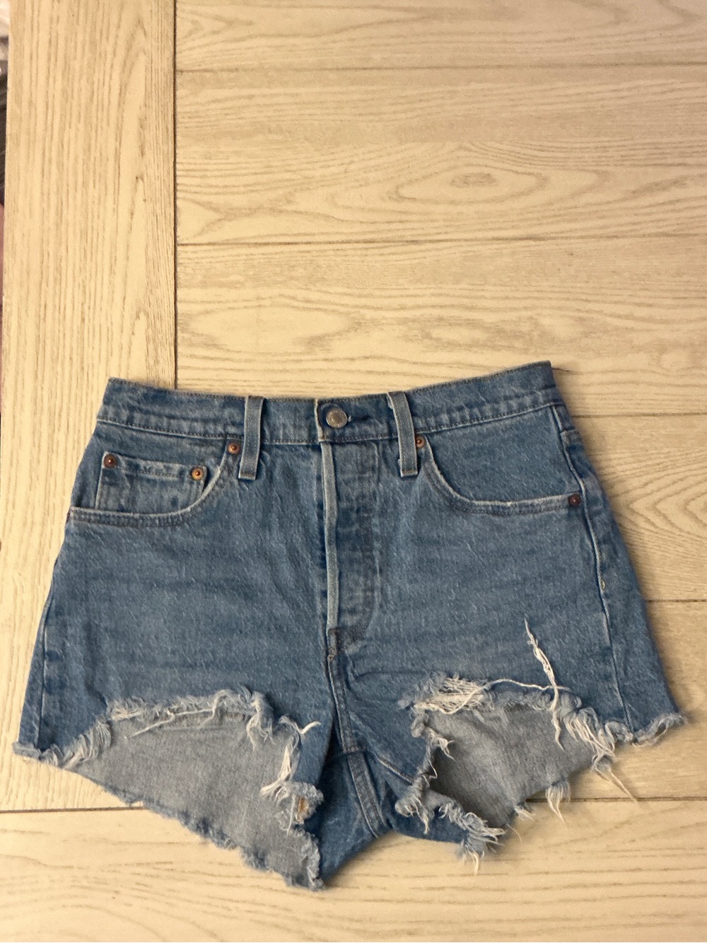 Levi's Medium Blue Distressed Cutoff Jean Shorts